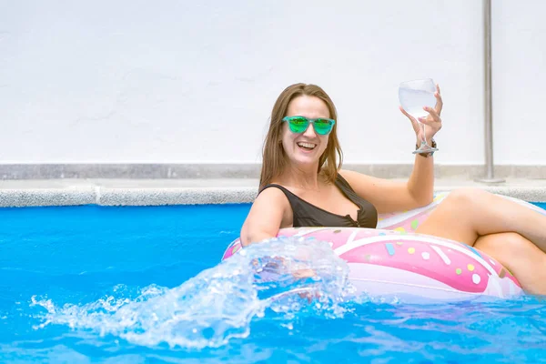 Attractive Young Blonde Woman Playing Float Drinking Cocktail Talking Mobile — Stock Photo, Image