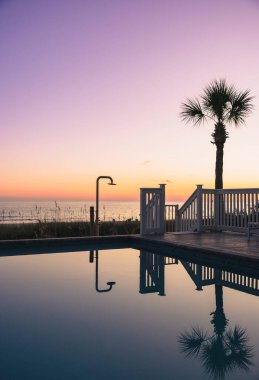 View over looking the ocean as the sun is setting on Laguna Beach clipart