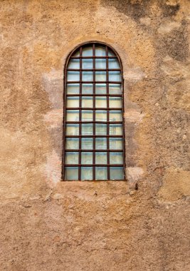 old window with rusted security