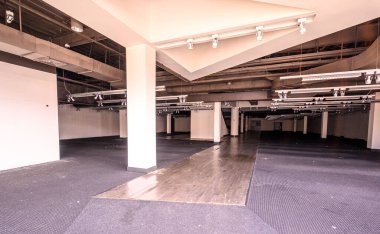 Out of business stores  in a shut down a shopping mall.