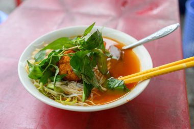 close up shot of Vietnamese soup street food with meatball