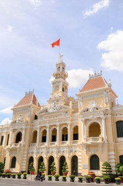 side view of Peoples Committee Building blue sky in background 