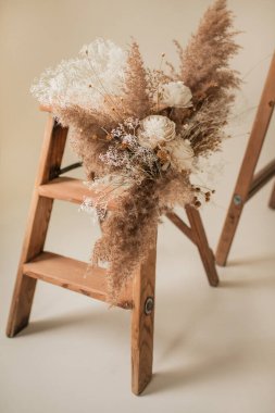 Fall Floral Decor Bouquet on Wooden Ladder in Photography Studio
