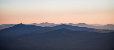 Sunrise flight over Vermont as seen by small airplane