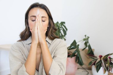 Woman Meditating Using Healing Crystal Stone clipart