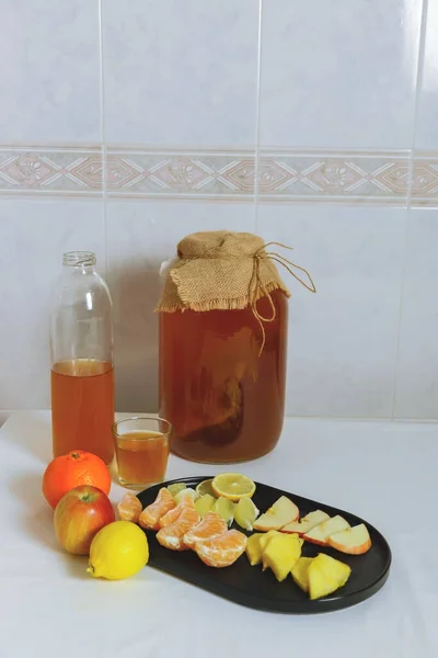 Large Glass Bottle Fermented Kombucha Tea White Kitchen Table Assorted — Stock Photo, Image
