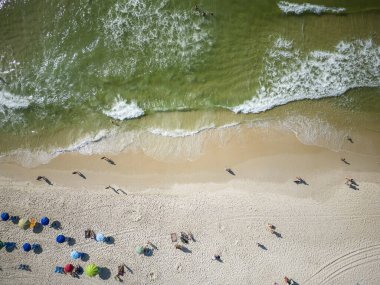 Beautiful top down view to Copacabana beach with water and beach umbrellas on the sand, Rio de Janeiro, Brazil