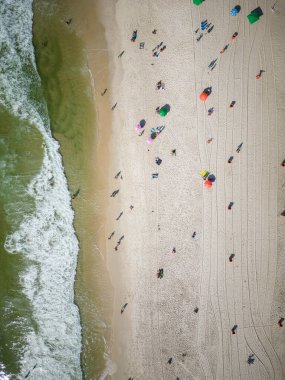 Beautiful top down view to Copacabana beach with water and beach umbrellas on the sand, Rio de Janeiro, Brazil
