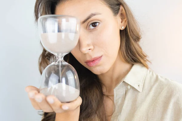 Young Woman Aging Holding Hourglass — Fotografia de Stock