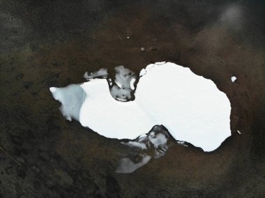 Icy River in Winter Look down Aerial Footage