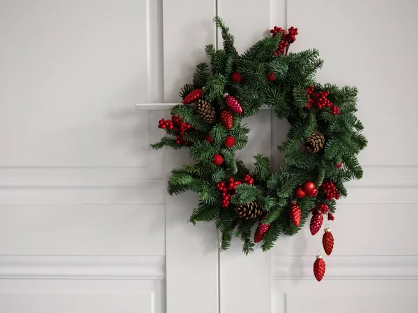 flatlay christmas tree wreath with decorations