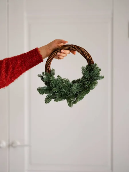 flatlay christmas tree wreath with decorations
