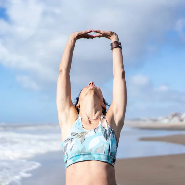 Woman Doing Stretching Exercises Beach — Stok fotoğraf