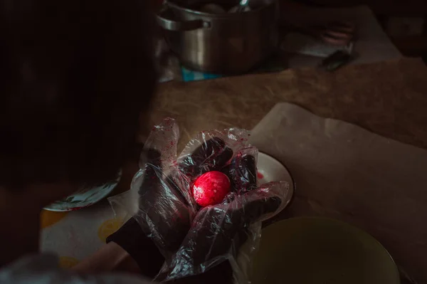 Girl Plastic Gloves Paints Red Easter Egg — Stockfoto