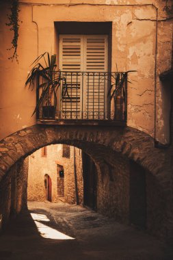 Balcony above a tunnel that crosses some streets of a beautiful town