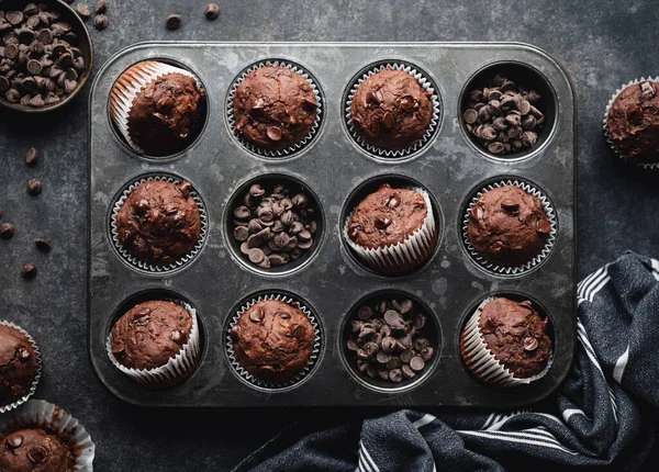 Overhead Tin Chocolate Zucchini Muffins Black Background — Stockfoto