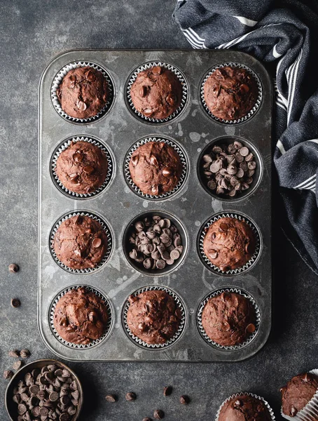Overhead Tin Chocolate Zucchini Muffins Black Background — Stockfoto