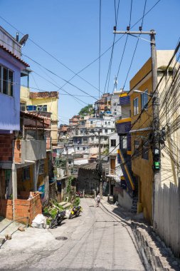 Beautiful view to poor favela houses on hill side and power lines, Rio de Janeiro, Brazil
