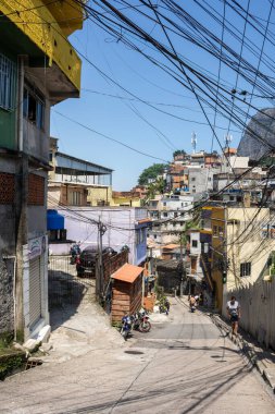 Beautiful view to poor favela houses on hill side and power lines, Rio de Janeiro, Brazil