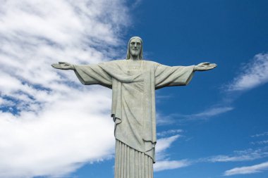 Beautiful view to Christ the Redeemer statue with blue sky and sunny day, Rio de Janeiro, Brazil