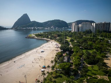 Beautiful aerial view to green areas, city buildings and mountains in Rio de Janeiro, Brazil