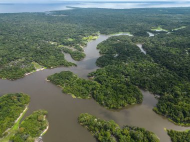 Beautiful aerial drone view to large rivers and green rainforest in the Brazilian Amazon