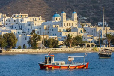 Colorful boats in blue water on Amorgos, Greek Islands