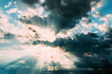 Clouds Bursting with Light Rays