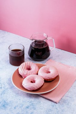 homemade donuts with pink berry glaze