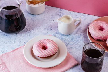 homemade donuts with pink berry glaze