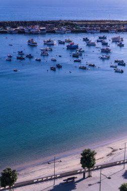 Beach and berth with boats and yachts