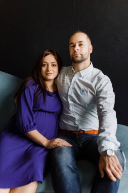 couple expecting a child is experiencing a happy period of pregnancy