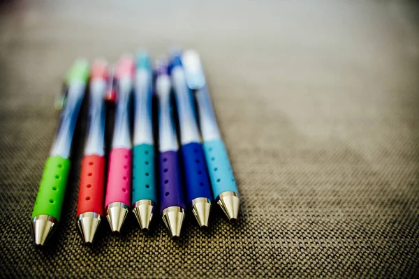 Colorful Pens Lined Table — Stock Photo, Image