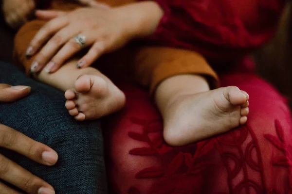 Baby Feet Close While Sitting Parents Lap — Stock Photo, Image