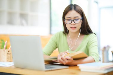 Young woman video conference and study online at home.