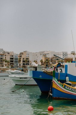 Colorful boats docked in the port in Malta