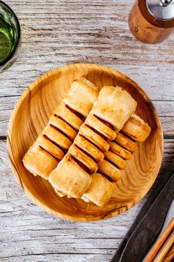 homemade sausage in dough in a plate
