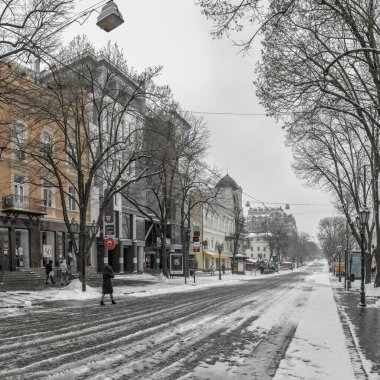 Odessa, Ukraine 29.01.2023. Deribasovskaya street in Odessa, Ukraine, on a gloomy winter day