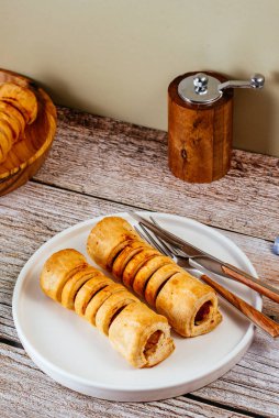 homemade sausage in dough in a plate
