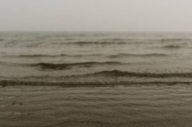 Abstract image of the waves on Puget Sound during the 2020 wildfires