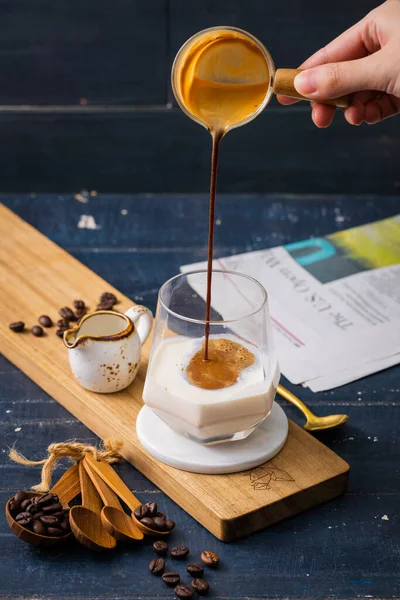 Pouring Coffee Cup Milk Wooden Plate — Fotografia de Stock