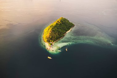 Aerial drone of an idyllic island in Flores, Labuan Bajo, Indonesia.