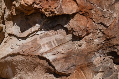 Petroglyph on rock in Utah desert