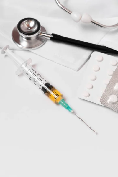 Close Syringe Loaded Medication Background Pills Stethoscope Doctor Gown — Stockfoto