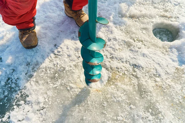 Warmly Dressed Asian Guy Drills Hole Ice Winter — Stock Photo, Image