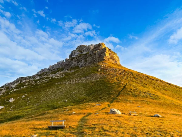 stock image beautiful mountain landscape with a sunny mountain peak