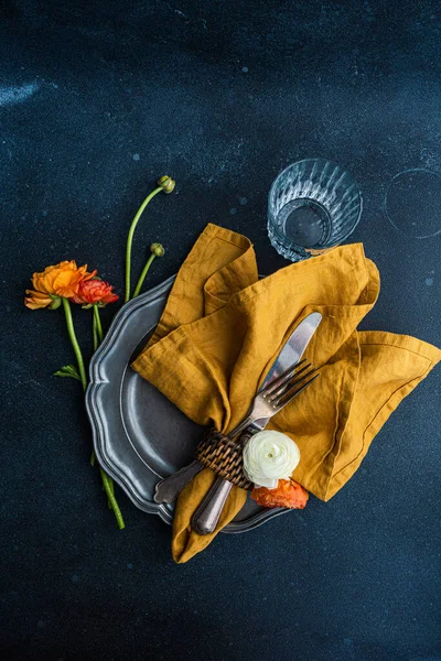 stock image Table setting with Ranunculus flowers on concrete background