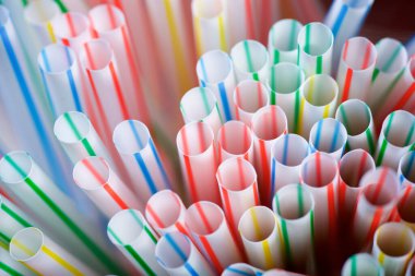 Top view of a group of plastic straws clipart