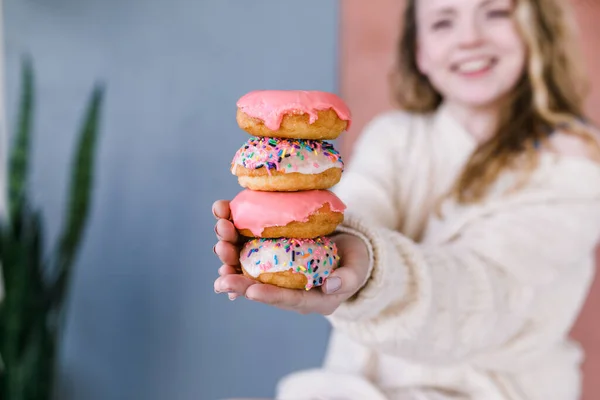Happy Woman Smiling Holding Stack Donuts Hand — Stock Photo, Image