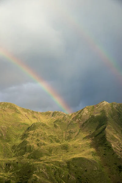 Rainbow during a storm in the Pyrenees.